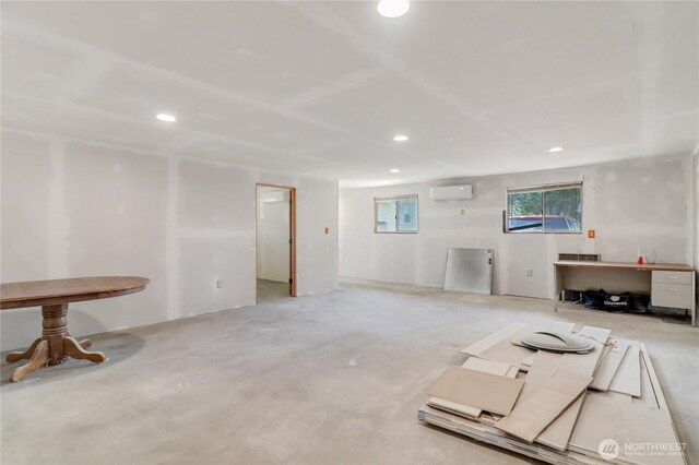 108 2nd St SE, Rainier, WA 98576 - basement with a wall mounted AC and recessed lighting
