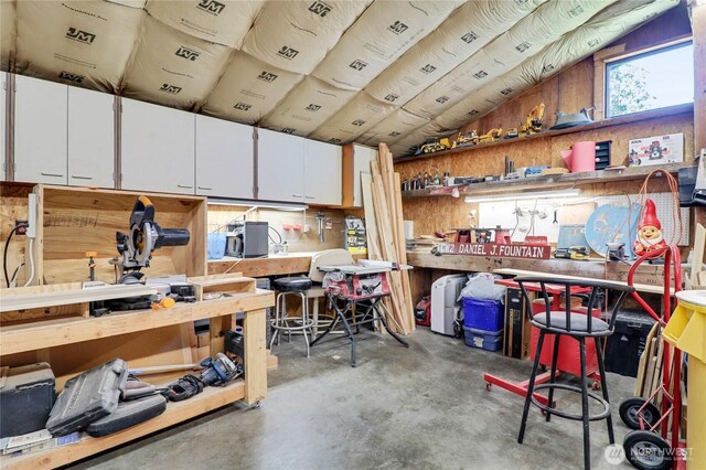 108 2nd St SE, Rainier, WA 98576 - misc room with a workshop area, concrete flooring, and vaulted ceiling
