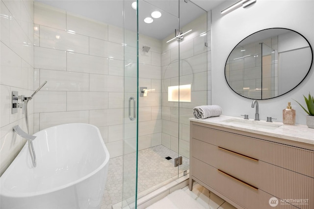 406 Center Pl, Everett, WA 98203 - full bathroom with vanity, a shower stall, and a freestanding bath