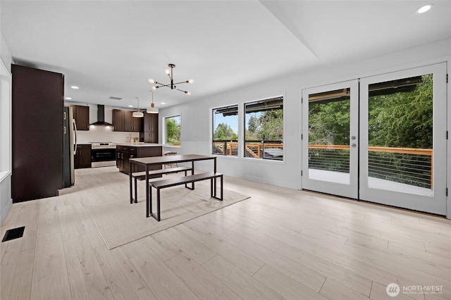 406 Center Pl, Everett, WA 98203 - rec room with a chandelier, recessed lighting, and light wood-style floors