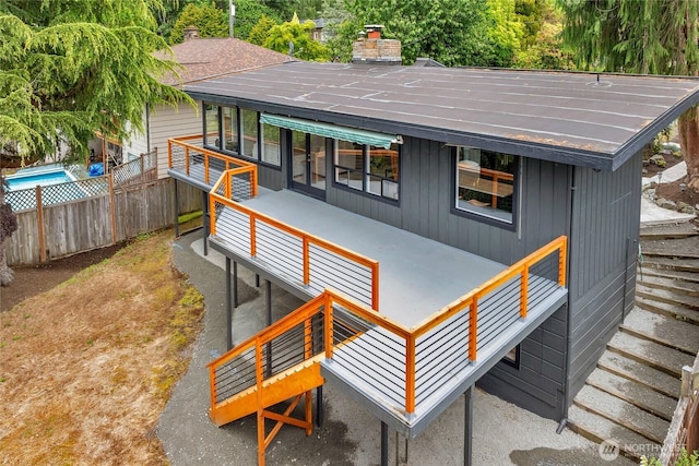406 Center Pl, Everett, WA 98203 - back of house with french doors and a chimney