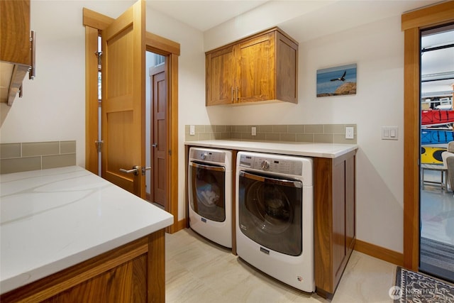 815 Carefree Way, Friday Harbor, WA 98250 - laundry room with cabinet space and washer and dryer