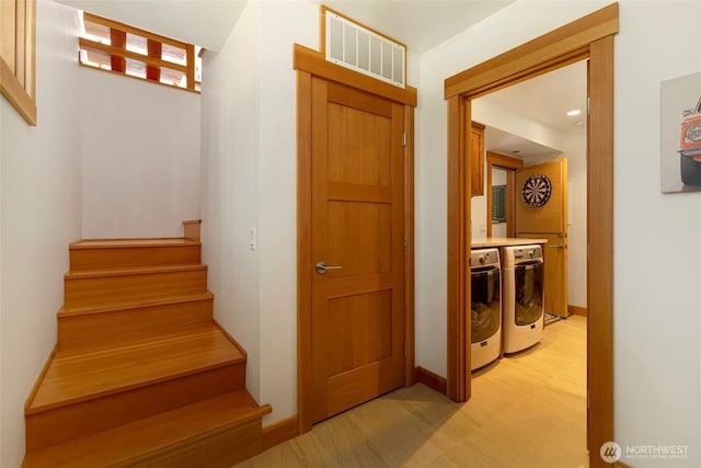 815 Carefree Way, Friday Harbor, WA 98250 - stairway with washer and dryer and baseboards