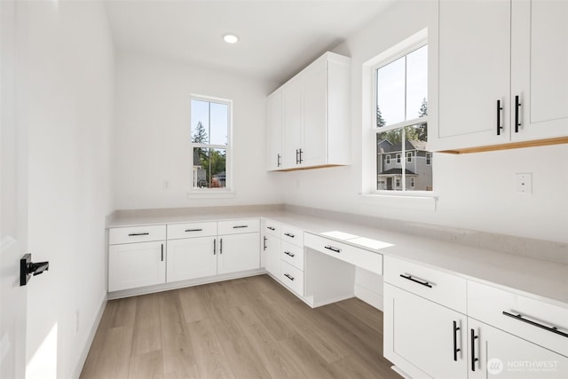 20620 97th Avenue St E Unit 16, Graham, WA 98338 - unfurnished office with light wood-style floors, built in desk, and recessed lighting