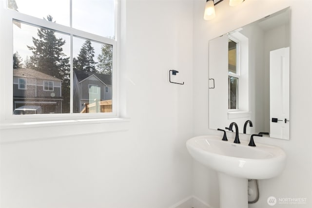 20620 97th Avenue St E Unit 16, Graham, WA 98338 - bathroom featuring a sink and baseboards