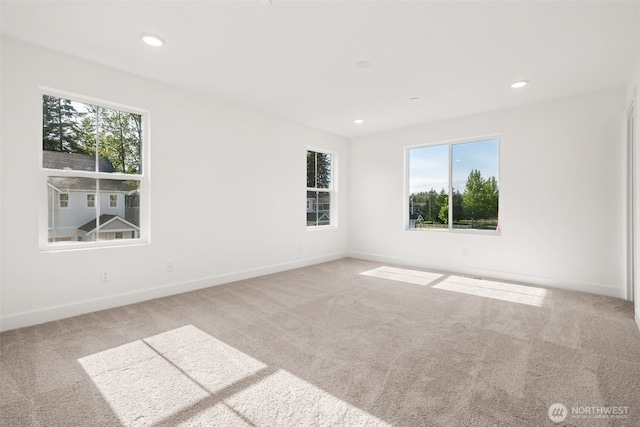 20620 97th Avenue St E Unit 16, Graham, WA 98338 - empty room with plenty of natural light, carpet floors, baseboards, and recessed lighting