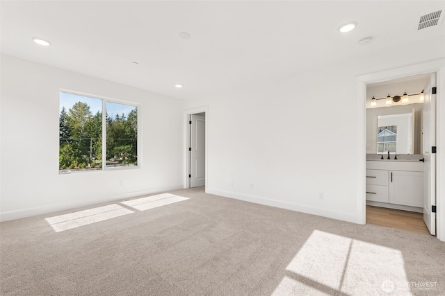 20620 97th Avenue St E Unit 16, Graham, WA 98338 - spare room featuring light carpet, baseboards, a sink, recessed lighting, and a smoke detector