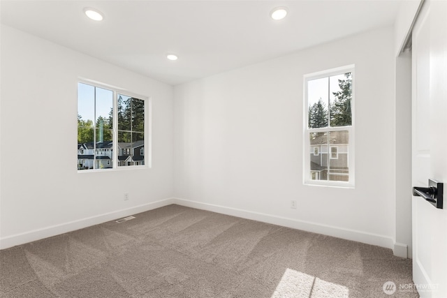 20620 97th Avenue St E Unit 16, Graham, WA 98338 - carpeted spare room with baseboards and recessed lighting