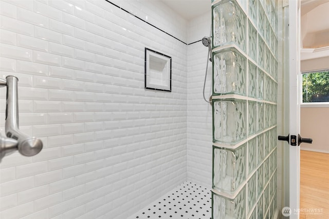 1550 N Narrows Dr, Tacoma, WA 98406 - bathroom featuring a tile shower and wood finished floors