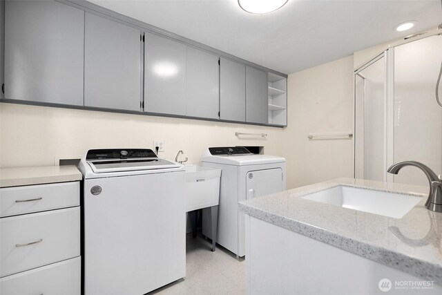 1550 N Narrows Dr, Tacoma, WA 98406 - washroom with cabinet space and washer and dryer
