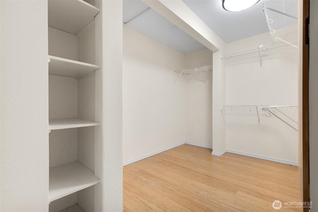 1550 N Narrows Dr, Tacoma, WA 98406 - walk in closet with wood finished floors