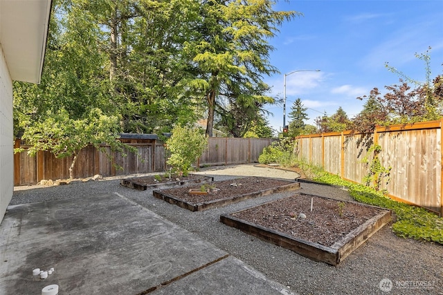 1550 N Narrows Dr, Tacoma, WA 98406 - fenced backyard with a garden and a patio