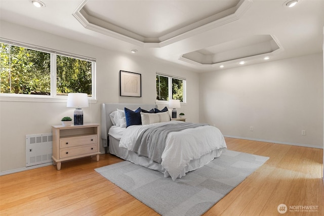 1550 N Narrows Dr, Tacoma, WA 98406 - bedroom featuring radiator heating unit, a raised ceiling, light wood-style flooring, and recessed lighting