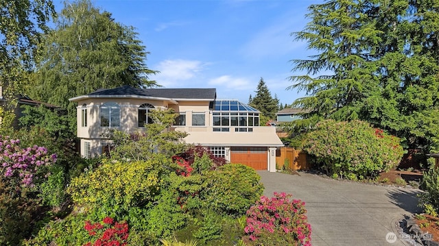 1550 N Narrows Dr, Tacoma, WA 98406 - view of front of property featuring asphalt driveway, stucco siding, and an attached garage
