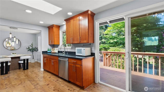 9824 NE 139th St, Kirkland, WA 98034 - kitchen with dishwasher, white microwave, a sink, a skylight, and brown cabinetry