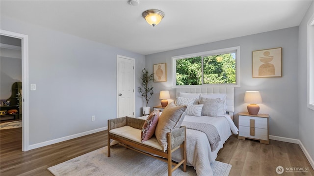 9824 NE 139th St, Kirkland, WA 98034 - bedroom featuring baseboards and wood finished floors