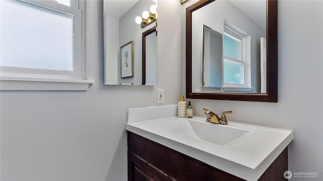 9824 NE 139th St, Kirkland, WA 98034 - bathroom with vanity and healthy amount of natural light