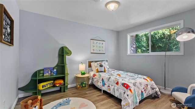 9824 NE 139th St, Kirkland, WA 98034 - bedroom with wood finished floors and baseboards