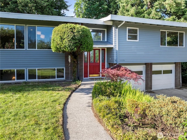 9824 NE 139th St, Kirkland, WA 98034 - view of front of property featuring a garage, asphalt driveway, and a front yard