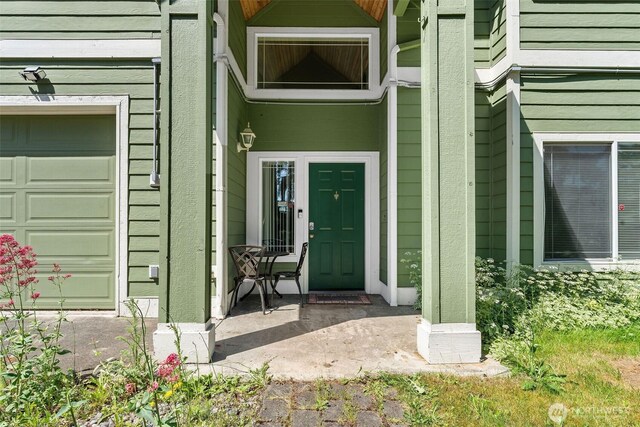 6940 35th St W, University Place, WA 98466 - property entrance featuring an attached garage