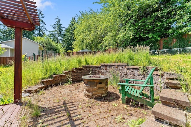 6940 35th St W, University Place, WA 98466 - view of patio / terrace featuring a fire pit
