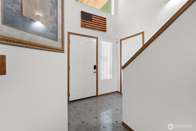6940 35th St W, University Place, WA 98466 - entrance foyer featuring granite floors and baseboards