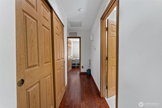 6940 35th St W, University Place, WA 98466 - hallway with dark wood finished floors and baseboards