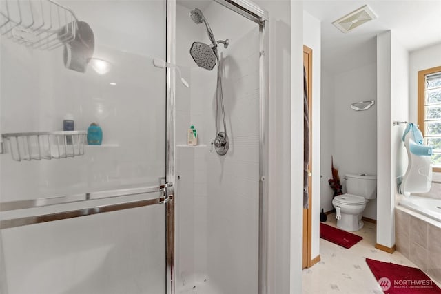 6940 35th St W, University Place, WA 98466 - bathroom featuring a stall shower, toilet, and a relaxing tiled tub