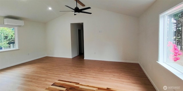 1645 S 272nd St Unit 11, Federal Way, WA 98003 - unfurnished room featuring a wall mounted air conditioner, healthy amount of natural light, light wood finished floors, and baseboards