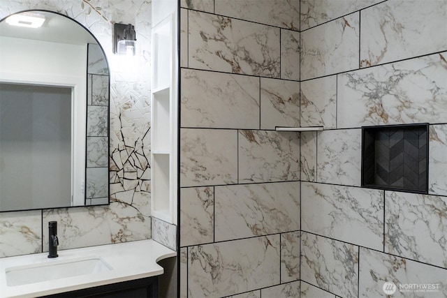1645 S 272nd St Unit 11, Federal Way, WA 98003 - bathroom featuring vanity, decorative backsplash, and tile walls