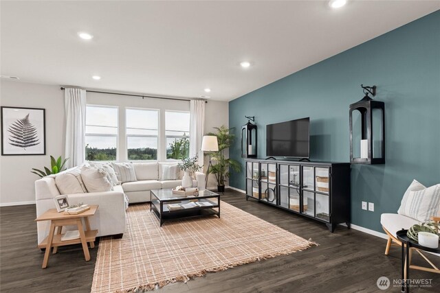 7318 281st Pl NW Unit 42, Stanwood, WA 98292 - living room featuring baseboards, wood finished floors, and recessed lighting