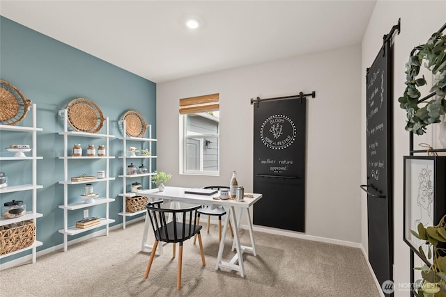 7318 281st Pl NW Unit 42, Stanwood, WA 98292 - office with a barn door, carpet flooring, and baseboards