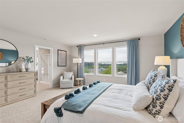 7318 281st Pl NW Unit 42, Stanwood, WA 98292 - carpeted bedroom featuring connected bathroom and baseboards