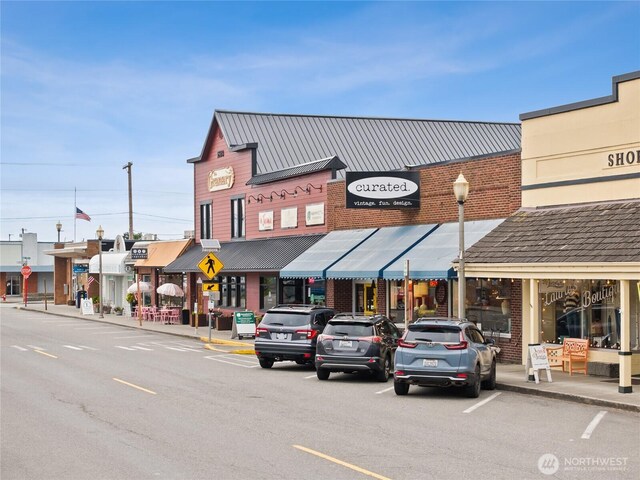 7318 281st Pl NW Unit 42, Stanwood, WA 98292 - view of property featuring uncovered parking
