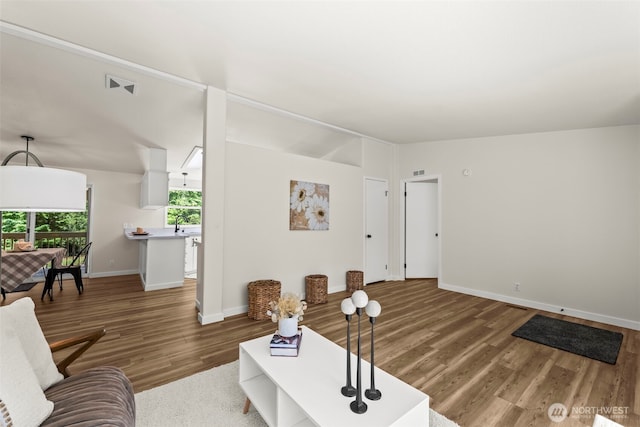 12323 Burchard Dr SW, Port Orchard, WA 98367 - living area featuring wood finished floors and baseboards