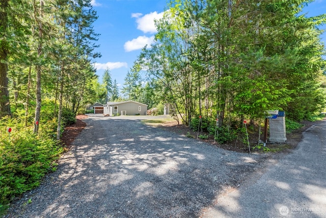 12323 Burchard Dr SW, Port Orchard, WA 98367 - view of property hidden behind natural elements with driveway