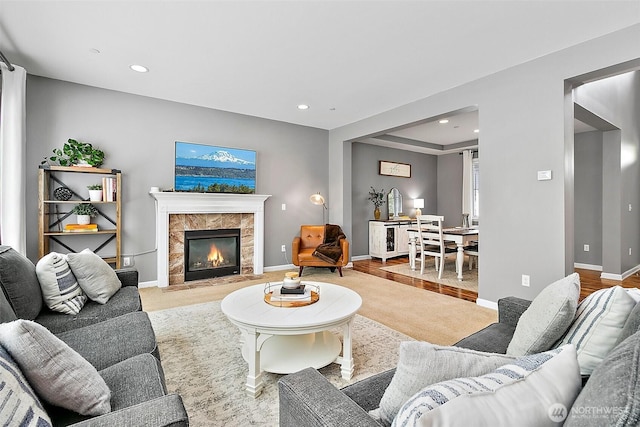 10508 174th Ave E, Bonney Lake, WA 98391 - living room with recessed lighting, a tile fireplace, and baseboards