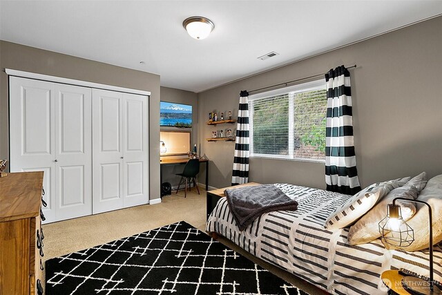 10508 174th Ave E, Bonney Lake, WA 98391 - carpeted bedroom featuring a closet and baseboards