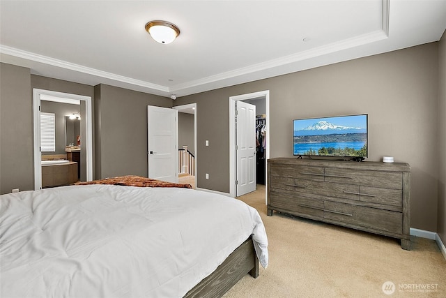 10508 174th Ave E, Bonney Lake, WA 98391 - bedroom featuring light carpet, baseboards, ornamental molding, connected bathroom, and a spacious closet