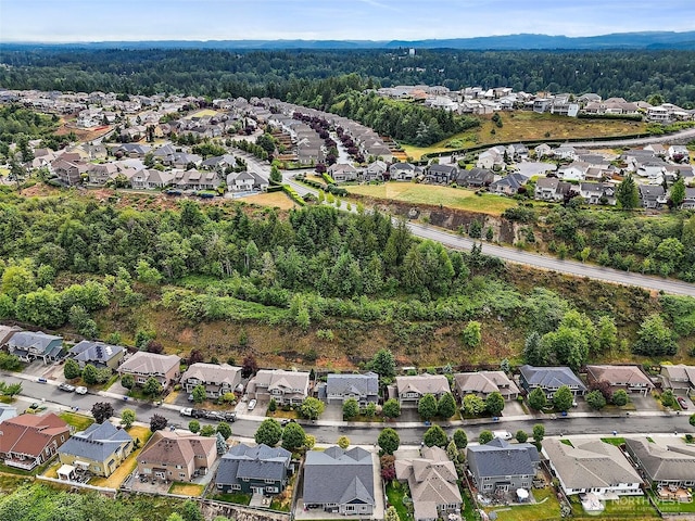 10508 174th Ave E, Bonney Lake, WA 98391 - aerial overview of property's location featuring nearby suburban area and a heavily wooded area