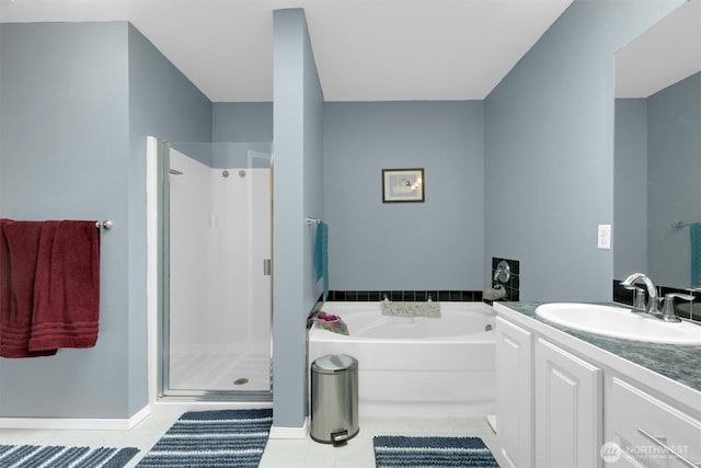 9505 S 214th Pl, Kent, WA 98031 - full bathroom featuring a stall shower, a garden tub, vanity, and tile patterned floors