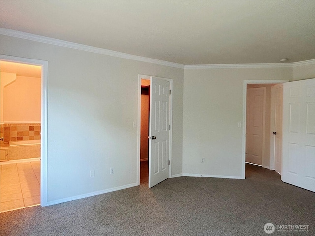 9002 Shadberry Dr SE, Olympia, WA 98513 - unfurnished bedroom featuring ornamental molding, carpet flooring, baseboards, and ensuite bath