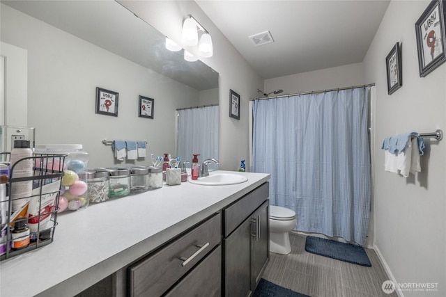 15028 Iverson Loop SE, Yelm, WA 98597 - full bath with vanity, toilet, and a shower with curtain