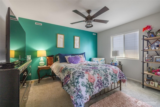 15028 Iverson Loop SE, Yelm, WA 98597 - carpeted bedroom featuring baseboards and a ceiling fan