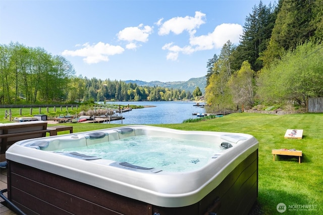 2 Greene Point Rd, Bellingham, WA 98229 - view of patio with a hot tub and a water and mountain view