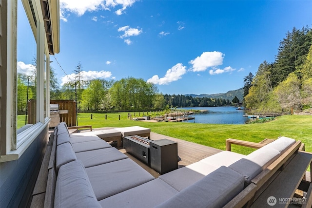 2 Greene Point Rd, Bellingham, WA 98229 - view of patio with a water and mountain view, an outdoor living space, and a view of trees