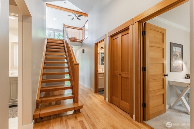 2 Greene Point Rd, Bellingham, WA 98229 - staircase featuring a ceiling fan, wood finished floors, baseboards, and ornamental molding