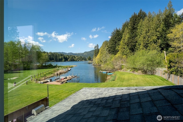 2 Greene Point Rd, Bellingham, WA 98229 - view of patio / terrace with a water and mountain view, a boat dock, and a view of trees
