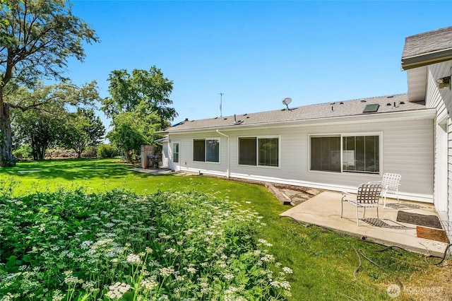 11801 Rd K NE, Moses Lake, WA 98837 - back of house featuring a patio and a yard