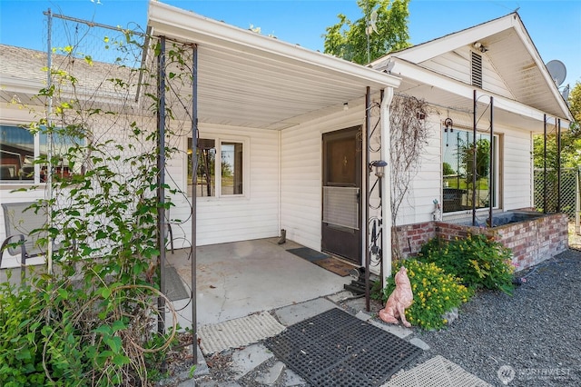 11801 Rd K NE, Moses Lake, WA 98837 - property entrance featuring an attached carport and covered porch